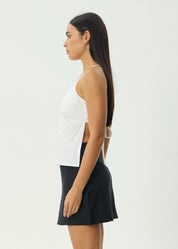 AFENDS ANNALISE STRAPPY TOP – ORGANIC COTTON V-NECK CROP WITH CROSSOVER BACK