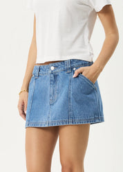 AFENDS LEXI DENIM MINI SKIRT – LOW-RISE SUSTAINABLE CARPENTER SKIRT – WORN BLUE