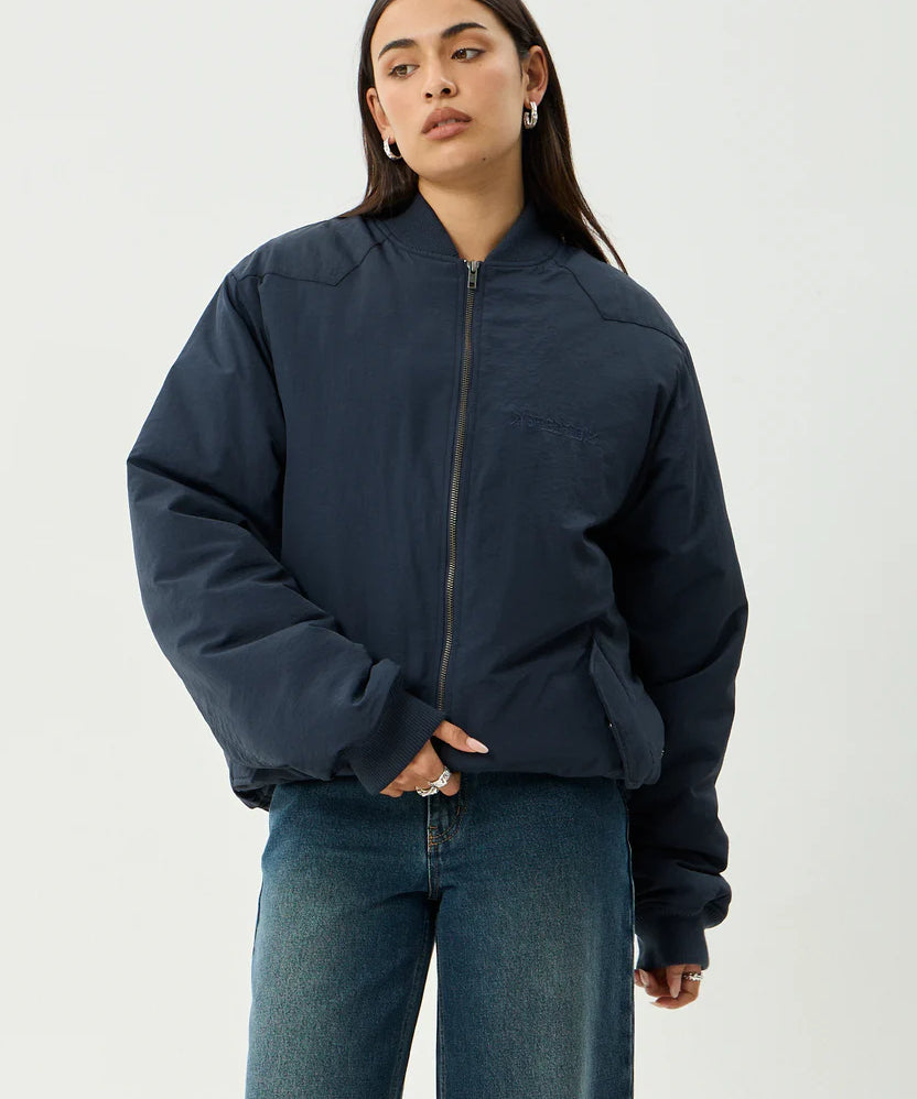 afends-no-more-bombs-bomber-jacket-deep-sea.webp
