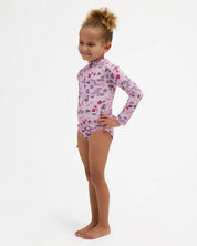 BILLABONG GIRLS 0-5 HULA HAZE ONE PIECE SHORTIE LONG SLEEVE RASH VEST – ORCHID