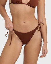 BILLABONG WOMENS SOL SEARCHER TIE SIDE TANGA BIKINI BOTTOM (COWHIDE)