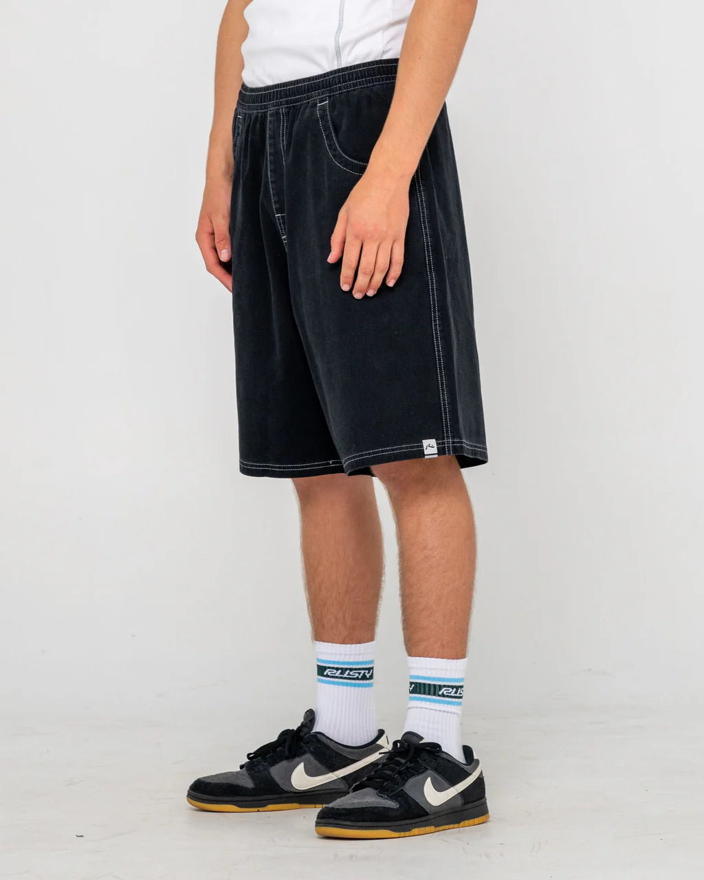 RUSTY FLIP DADDY 23 INCH ELASTIC BAGGY SHORT BLACK MENS SURF SHORTS
