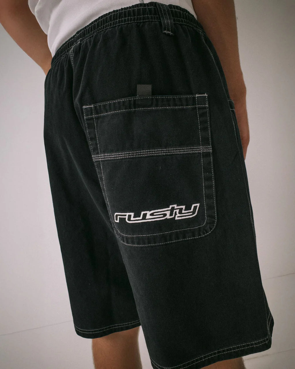 RUSTY FLIP DADDY 23 INCH ELASTIC BAGGY SHORT BLACK MENS SURF SHORTS