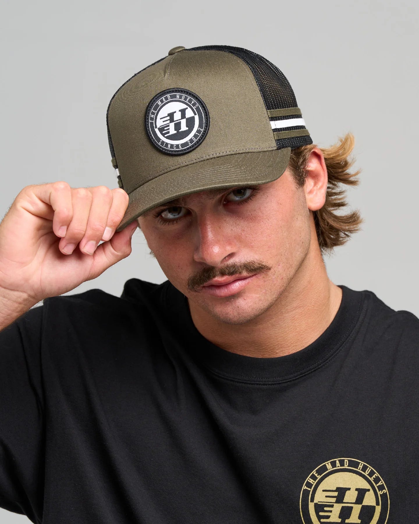 THE MAD HUEYS H SERIES SPLIT TWILL TRUCKER CAP MEN’S MESH SNAPBACK OLIVE