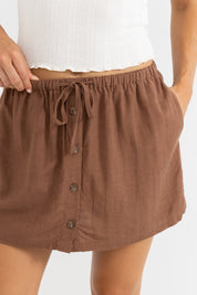 RHYTHM BEACH SIDE SKORT – MID-HIGH RISE RELAXED FIT SKORT WITH INTERNAL SHORTS – CHOCOLATE