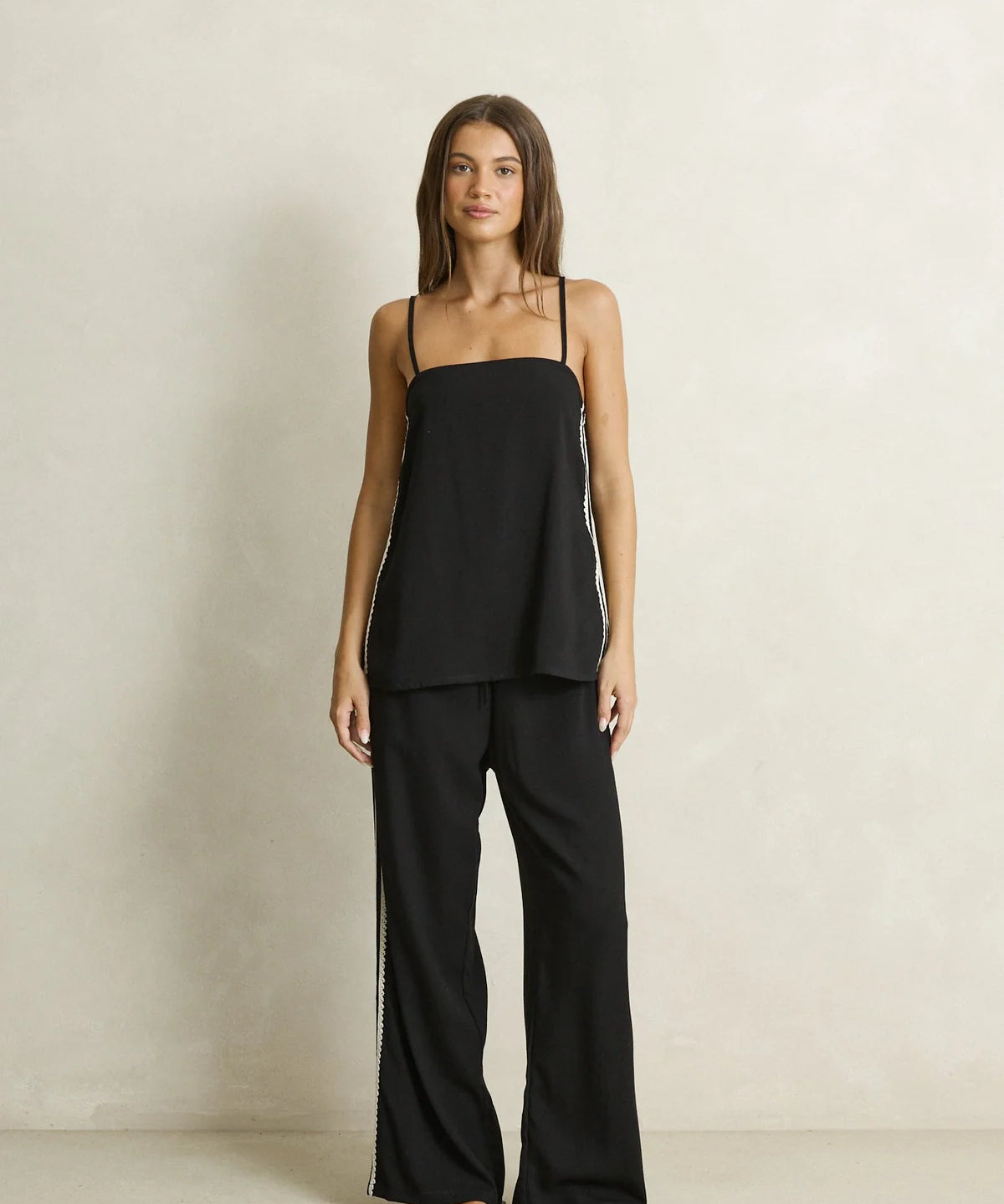 rhythm-linen-lace-top-black_f1f40fbd-8684-4880-aae4-6539053461ed.webp