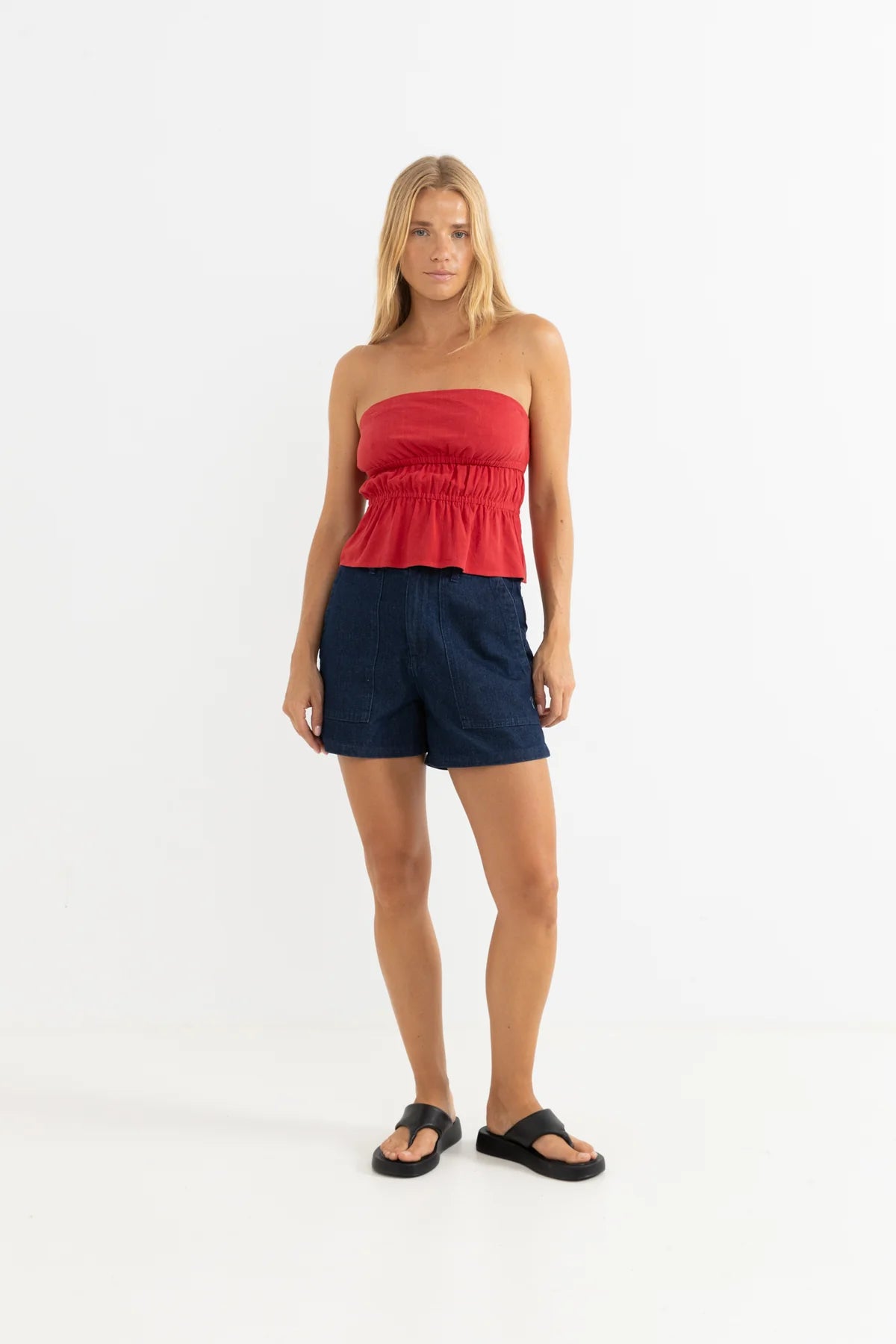 RHYTHM NADIA STRAPLESS TOP – SLIM FIT GATHERED PEPLUM STRAPLESS TOP – FIRE