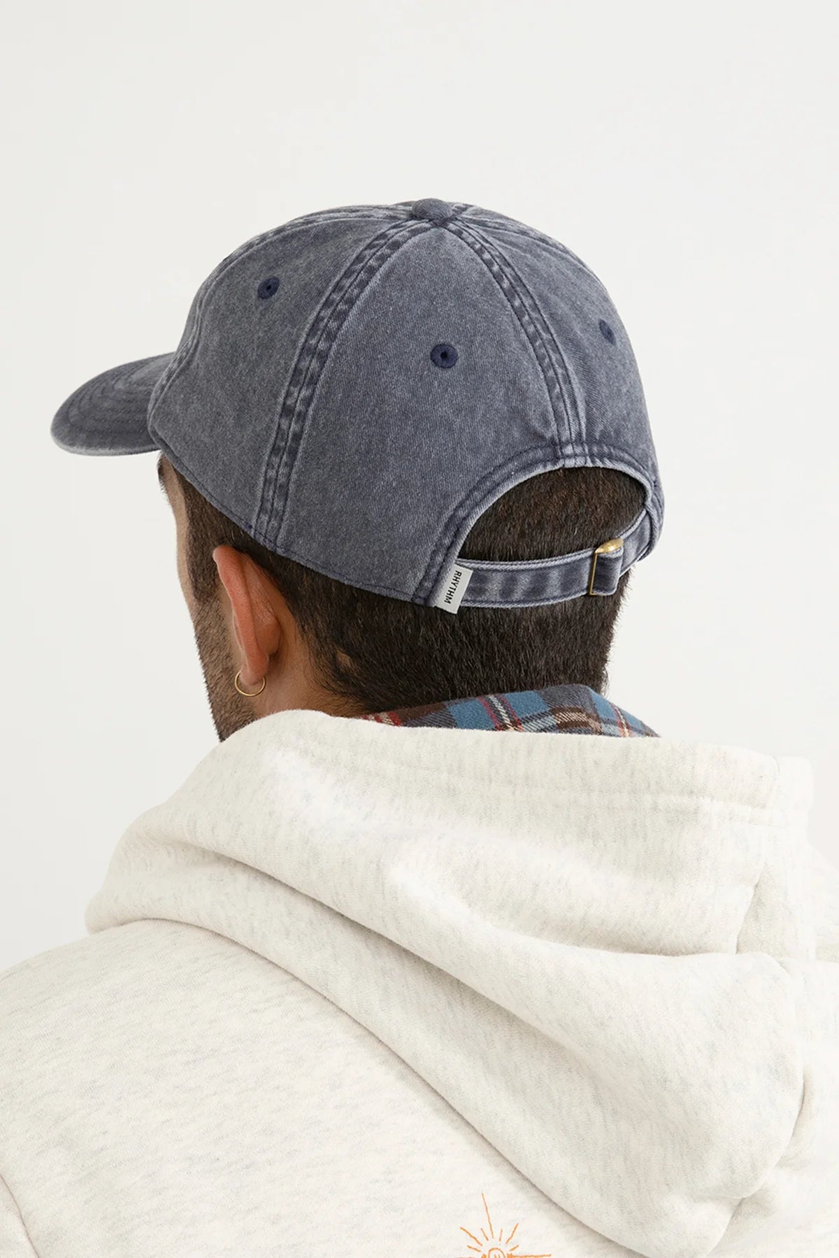 RHYTHM SPORTS CAP – PIGMENT-WASHED CURVED PEAK STRAP-BACK CAP WITH LOGO PATCH
