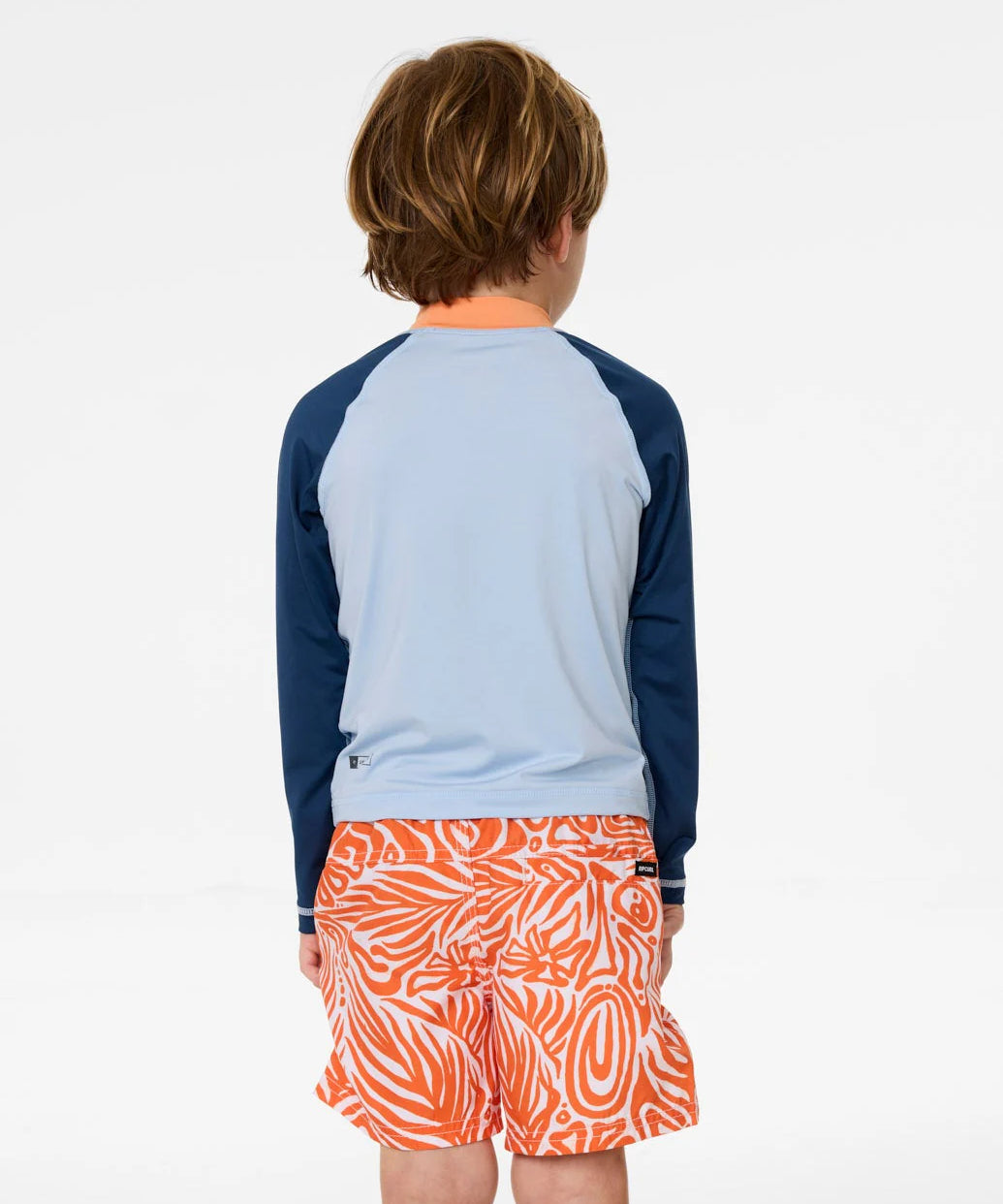 rip-curl-cosmic-surfing-upf-long-sleeve-rash-vest-kids-blue-wind-bodhi-surf1.webp