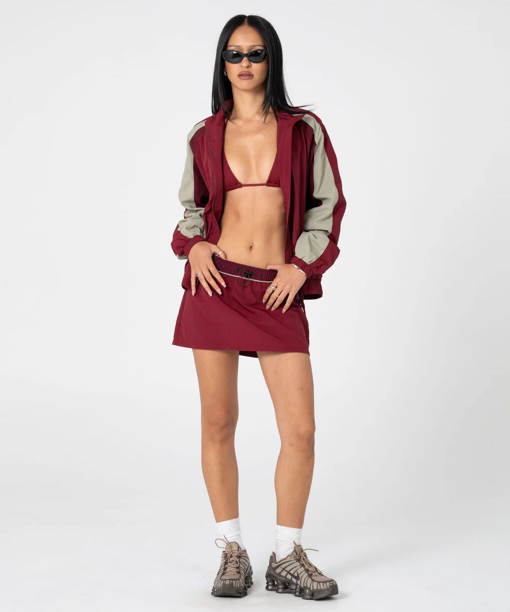 rusty-breezy-wind-cheater-mini-skirt-cranberry.webp