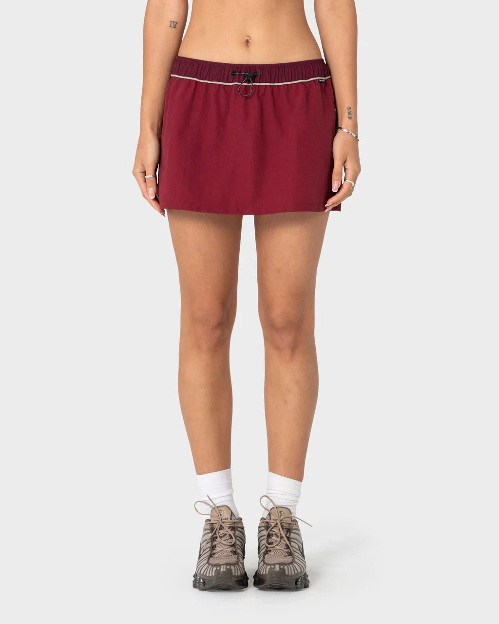 RUSTY BREEZY WIND CHEATER MINI SKIRT – CRANBERRY