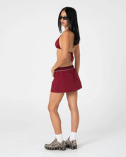 RUSTY BREEZY WIND CHEATER MINI SKIRT – CRANBERRY