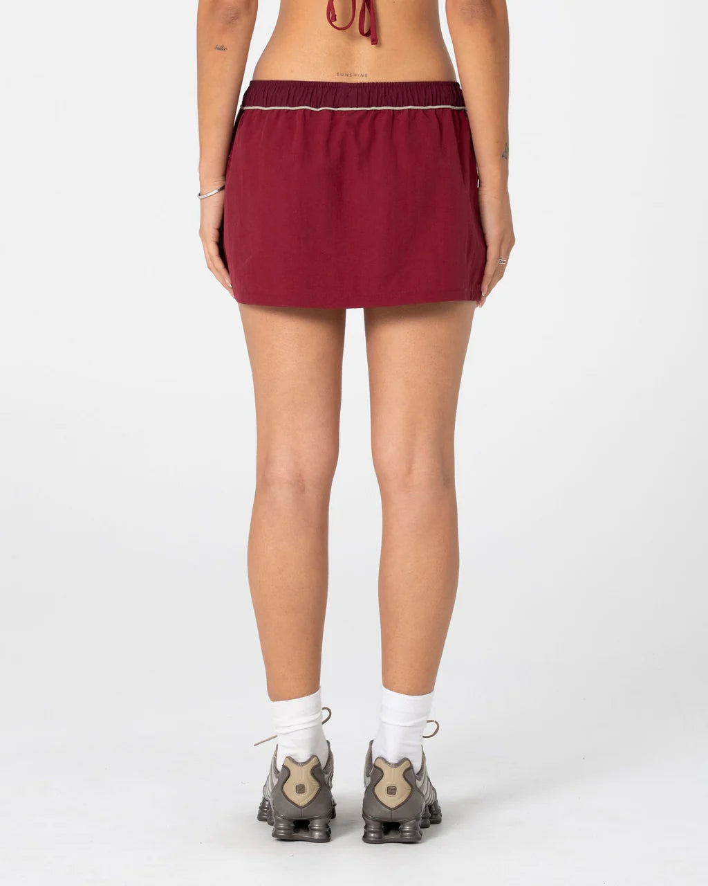 RUSTY BREEZY WIND CHEATER MINI SKIRT – CRANBERRY