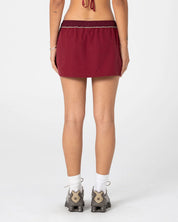 RUSTY BREEZY WIND CHEATER MINI SKIRT – CRANBERRY