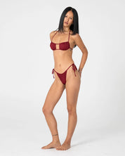 RUSTY CEDAR SIDE TIE CHEEKY BIKINI BOTTOM – CRANBERRY