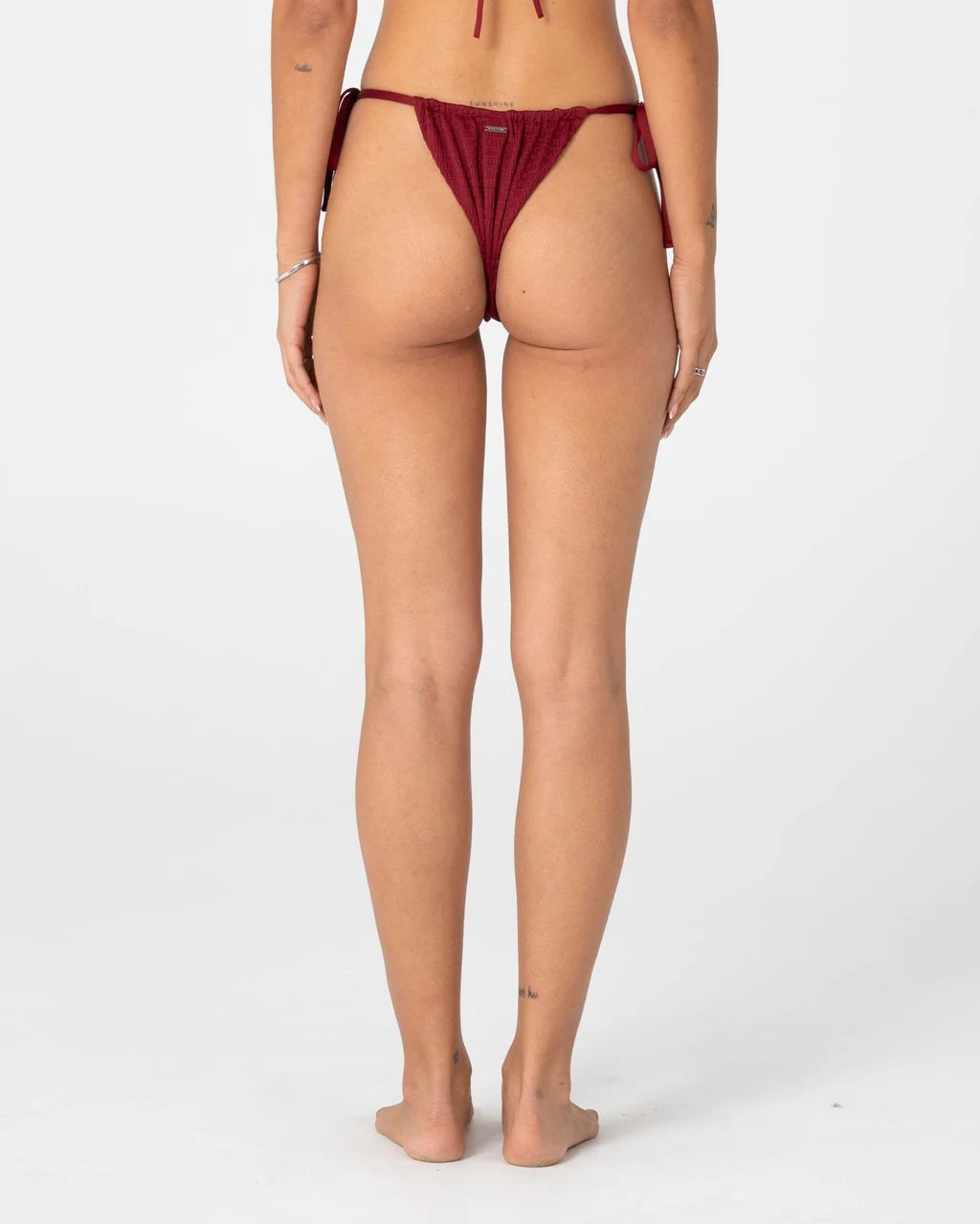 RUSTY CEDAR SIDE TIE CHEEKY BIKINI BOTTOM – CRANBERRY