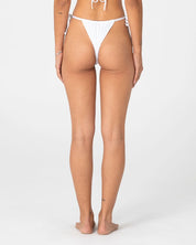 RUSTY CEDAR SIDE TIE CHEEKY BIKINI BOTTOM – WHITE