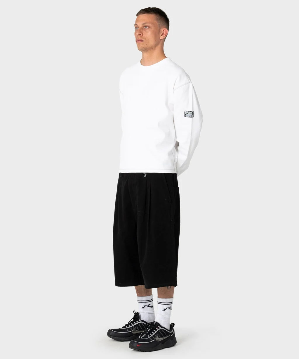 rusty-enigma-pleated-short-black.webp