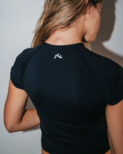 RUSTY ESSENTIALS SHORT SLEEVE ZIP THROUGH RASH VEST – WOMENS SURF TOP BLACK