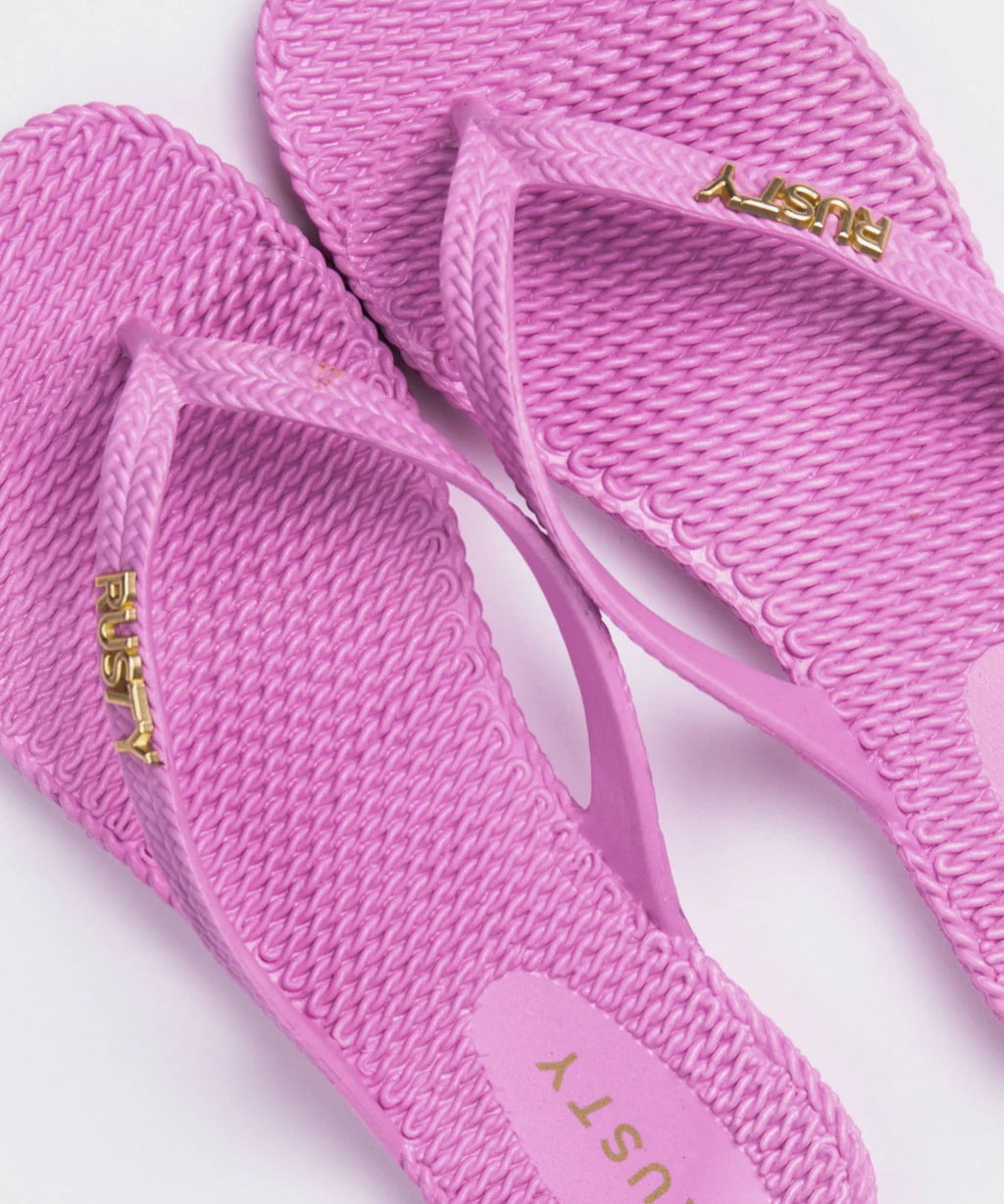 rusty-flip-out-thong-sandals-fondant-pink-bodhi-surf-side.webp