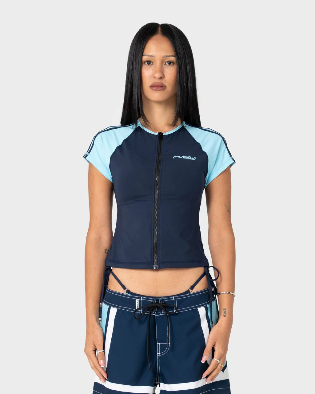 RUSTY MEL SEA ZIP THROUGH RASH VEST – NAVY / AQUA