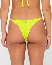 RUSTY SANDALWOOD RING CHEEKY BIKINI BOTTOM – WOMENS SWIMWEAR LIME PUNCH