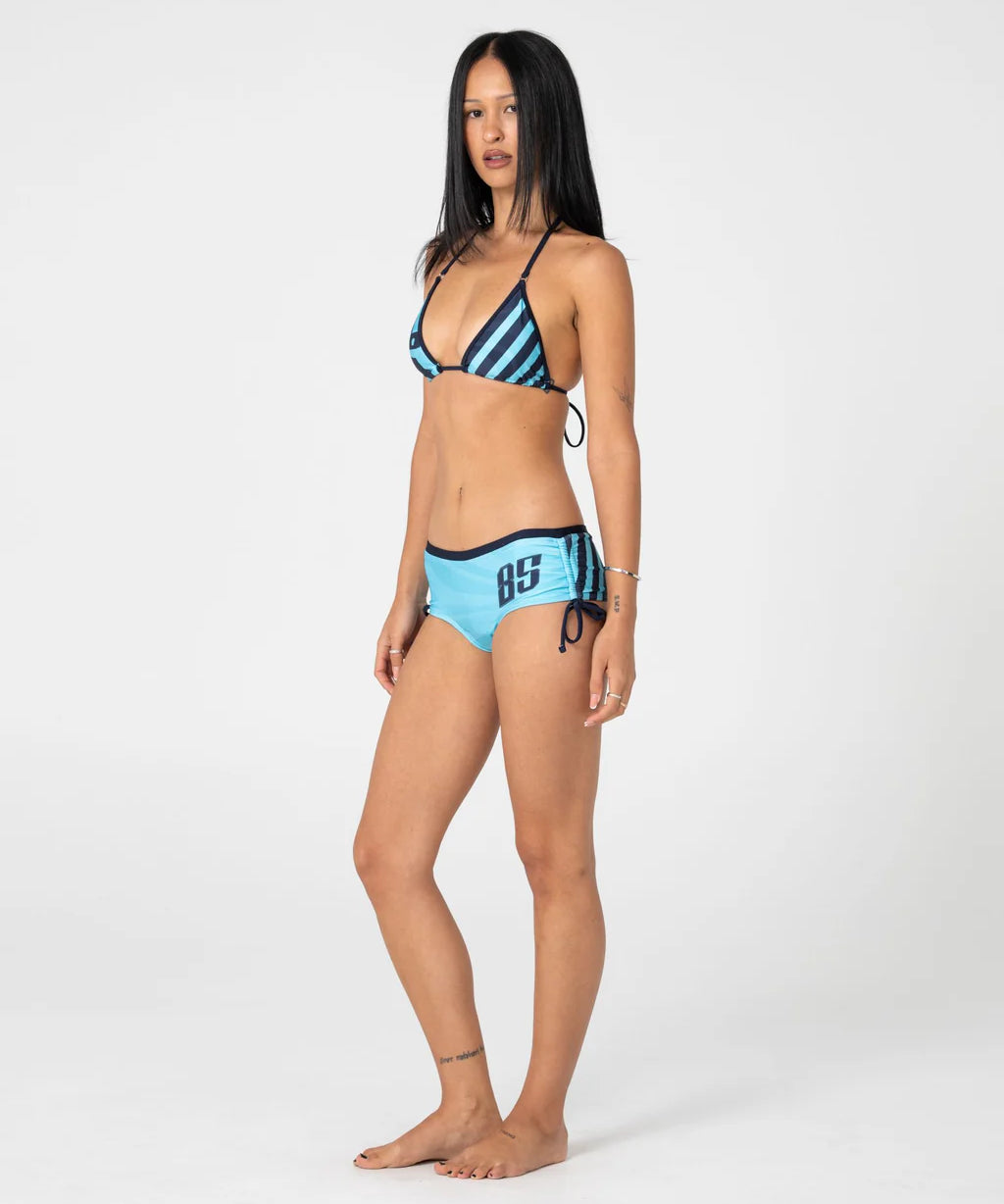 rusty-stardom-graphic-booty-bikini-bottom-navy-aqua.webp