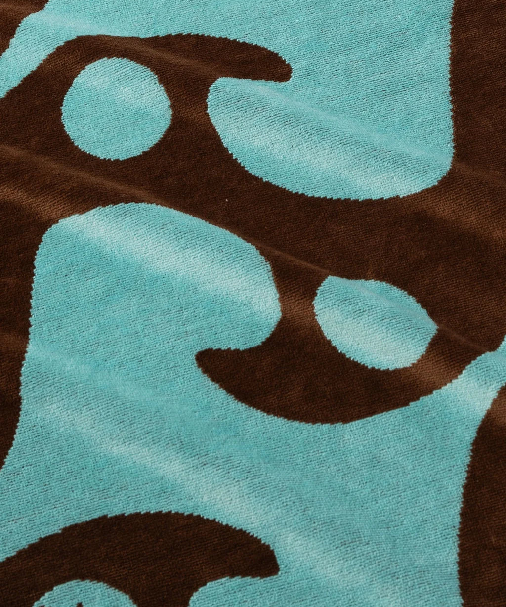 rusty-sun-drenched-graphic-towel-pinecone1.webp
