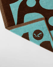 RUSTY SUN DRENCHED GRAPHIC TOWEL – PINECONE