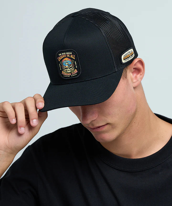 the-mad-hueys-caught-fk-all-skull-mens-trucker-cap-black-bodhi-surf.webp