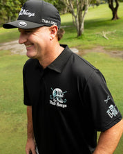 THE MAD HUEYS HITTIN FK ALL SS GOLF POLO – BLACK