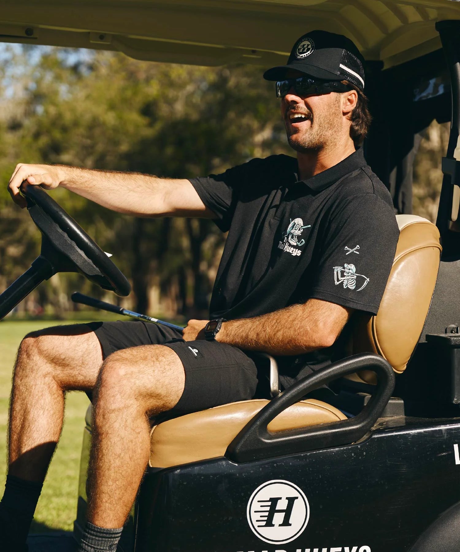 the-mad-hueys-hittin-fk-all-ss-golf-polo-black1.webp