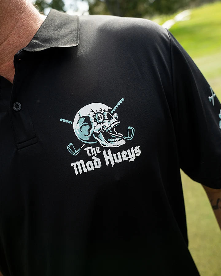 THE MAD HUEYS HITTIN FK ALL SS GOLF POLO – BLACK