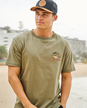 THE MAD HUEYS LESS BLUEYS T-SHIRT – OLIVE