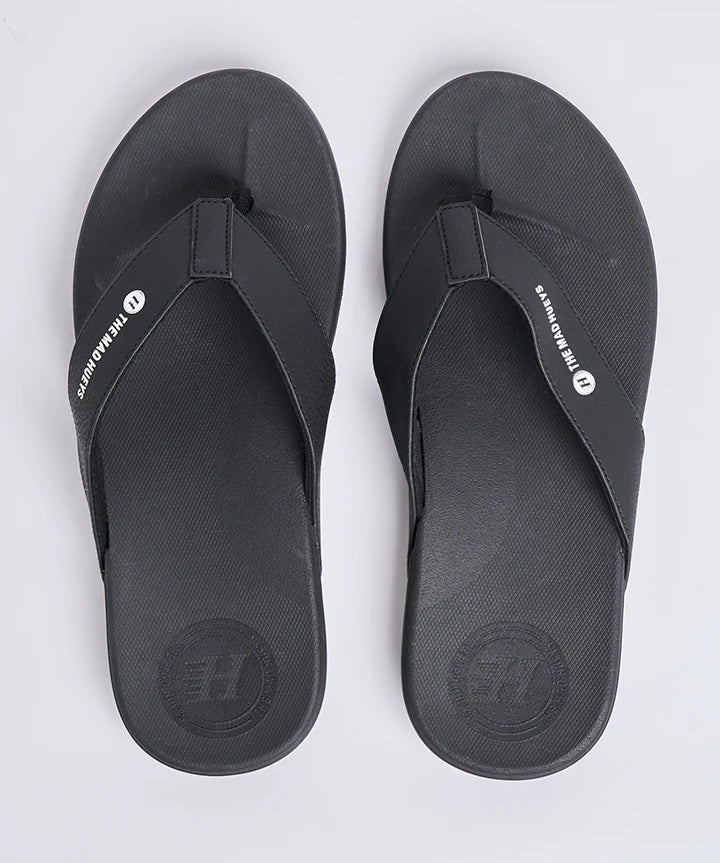 the-mad-hueys-wide-strap-mens-thongs-black-bodhi-surf.webp