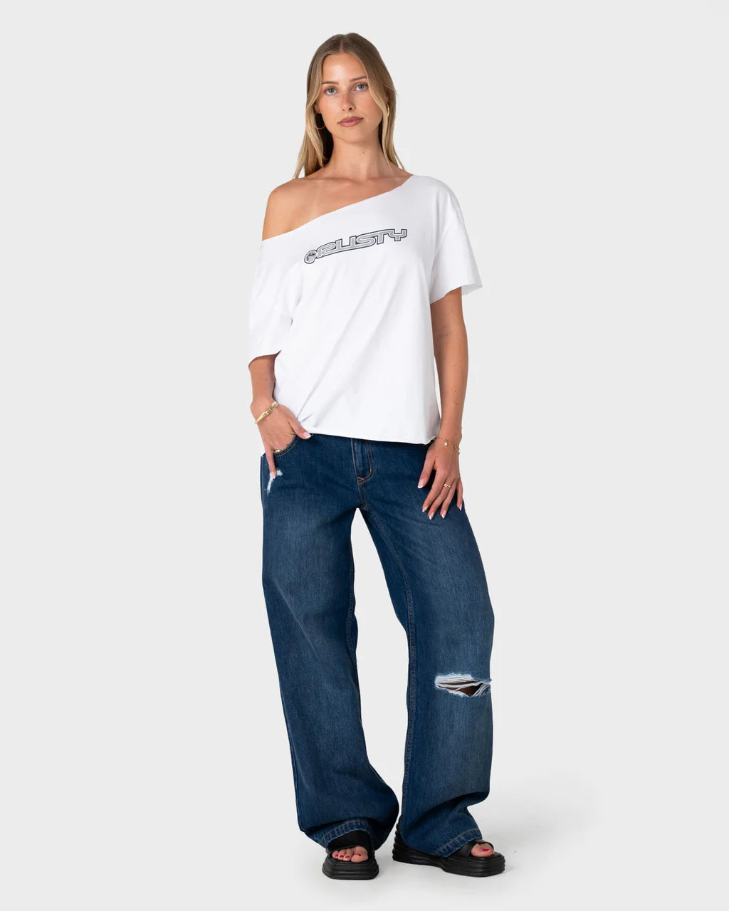 RUSTY NEW BUT OLD OFF SHOULDER GRAPHIC TEE WOMENS RELAXED TOP VINTAGE WHITE